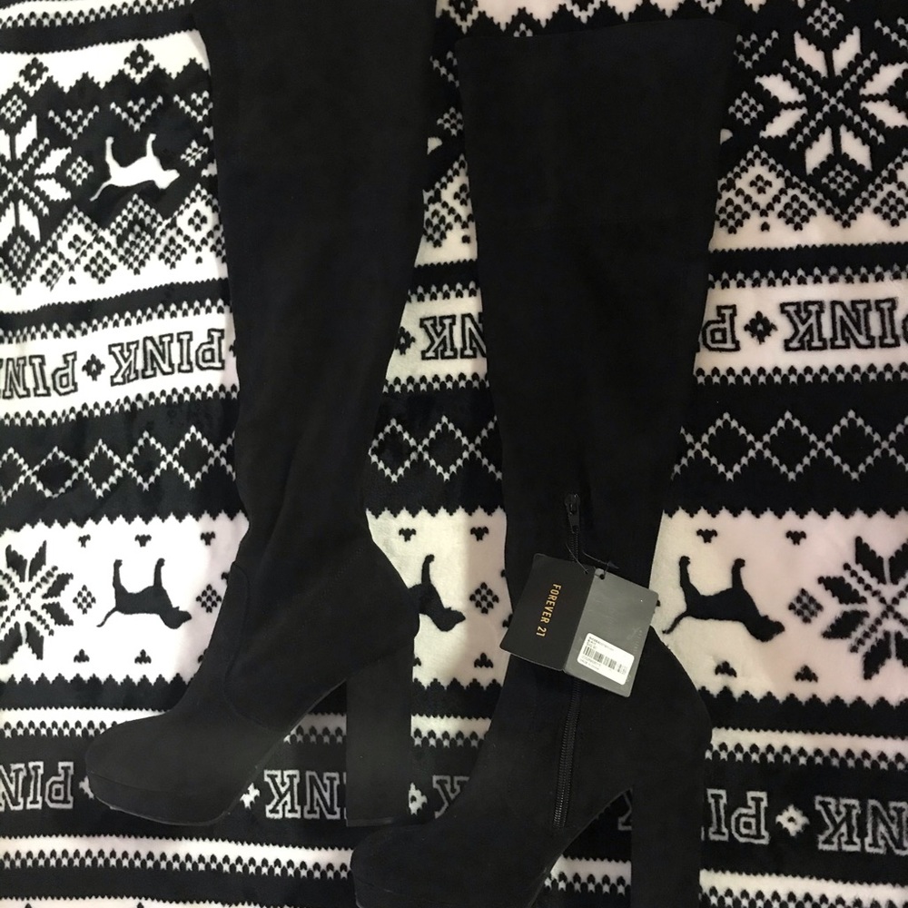 Over the knee black boots